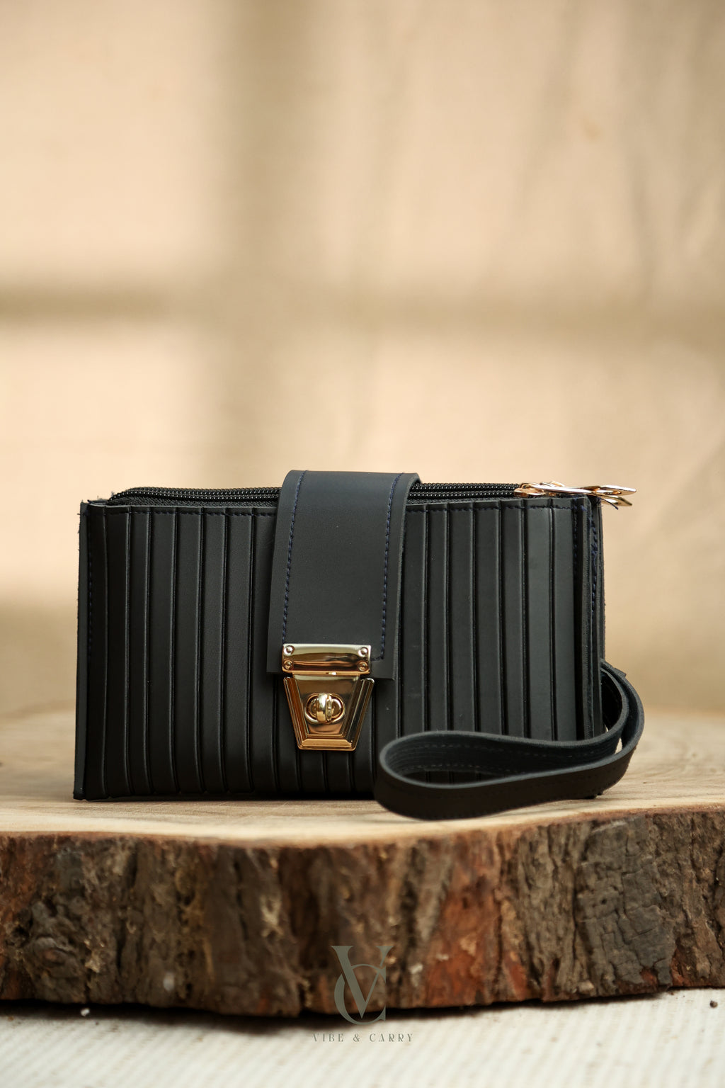Triple Zipper Noir Clutch