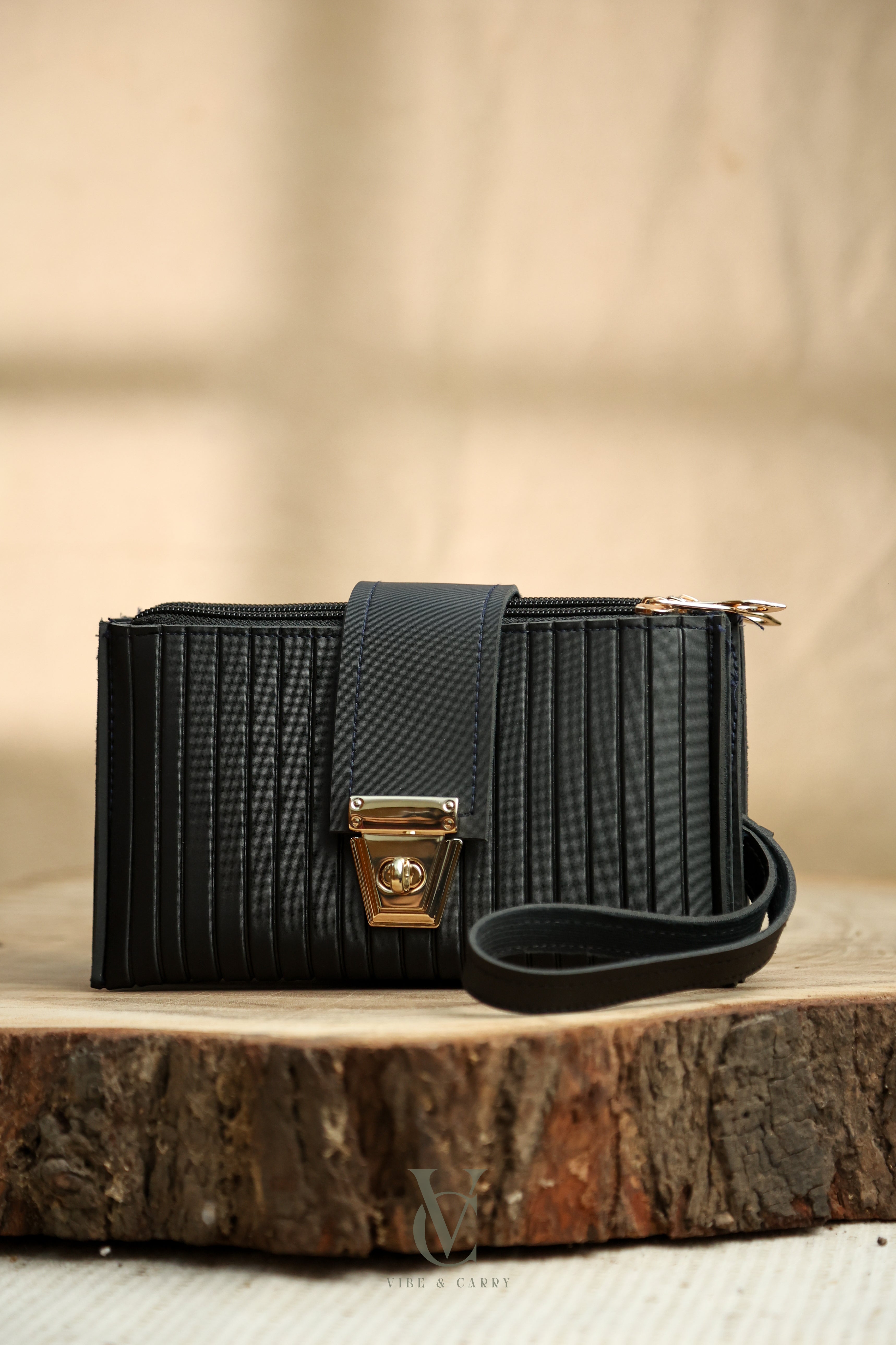 Triple Zipper Noir Clutch