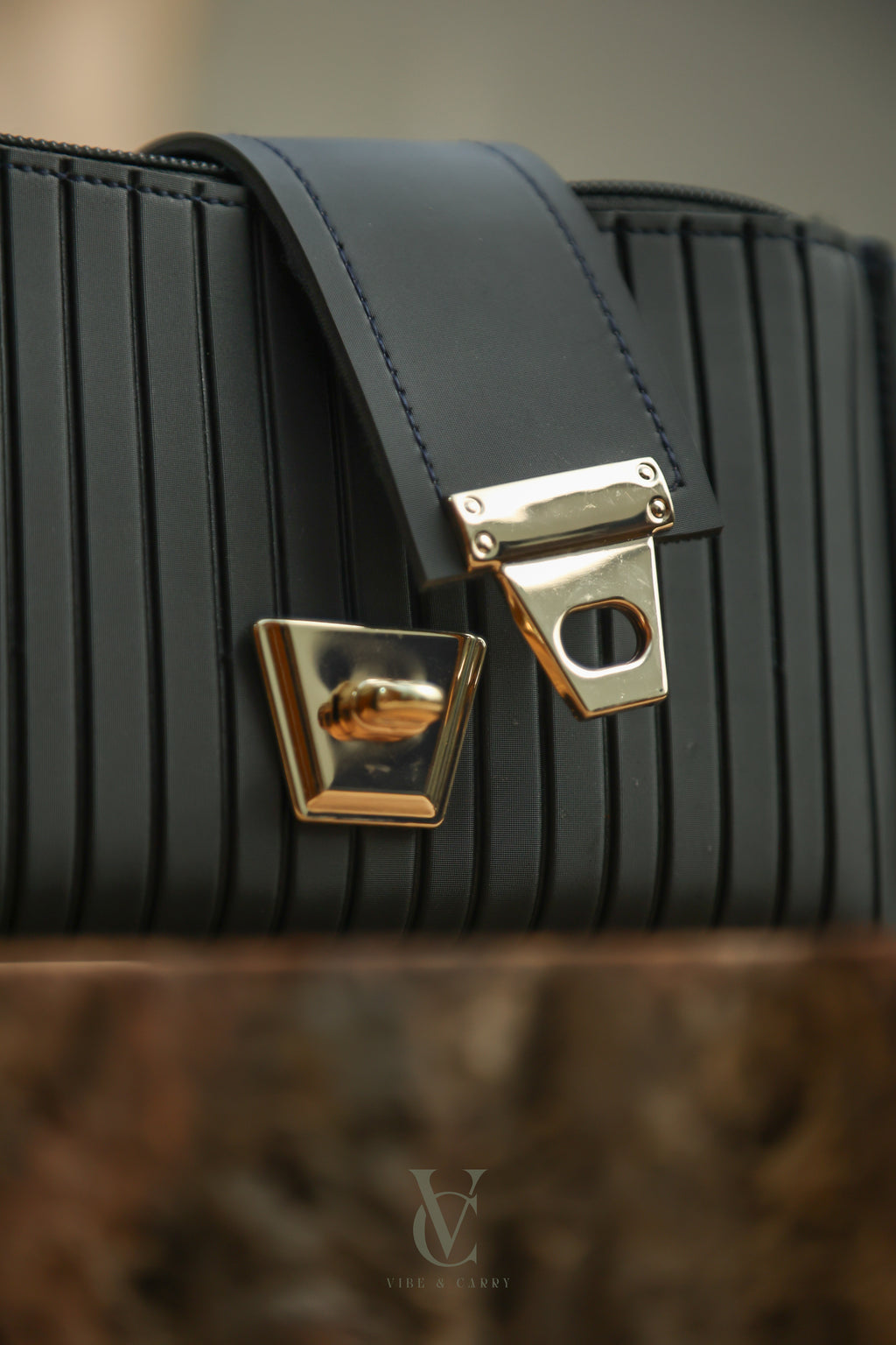 Triple Zipper Noir Clutch